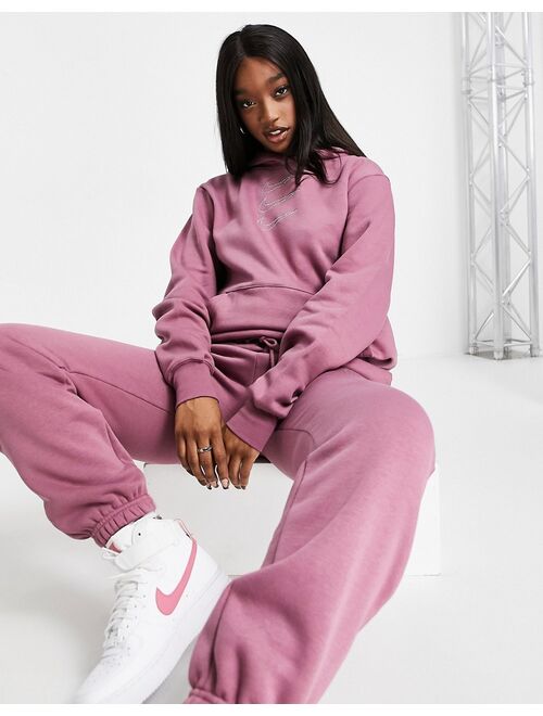 Nike Swoosh rhinestone applique washed hoodie in purple