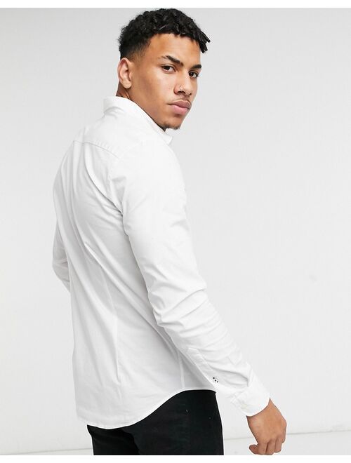 Tommy Hilfiger skinny fit shirt in white exclusive to Asos