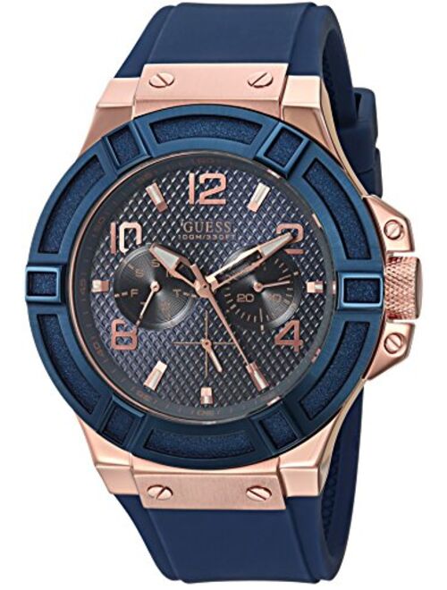 GUESS Men's Rigor Iconic Blue Stain Resistant Silicone Watch with Rose Gold-Tone Day + Date (Model: U0247G3)