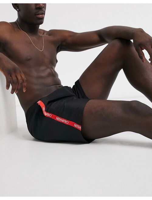 Calvin Klein medium length swim trunks in black