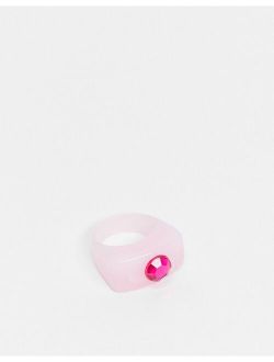 ring in pink plastic with fuchsia crystal