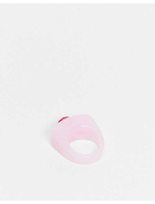 ASOS DESIGN ring in pink plastic with fuchsia crystal