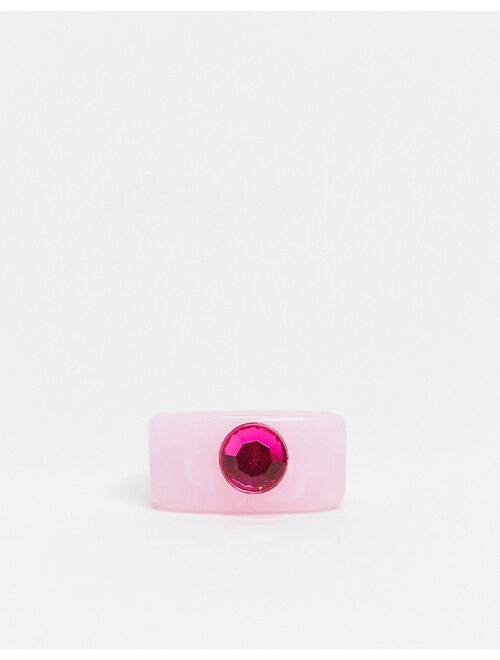 ASOS DESIGN ring in pink plastic with fuchsia crystal