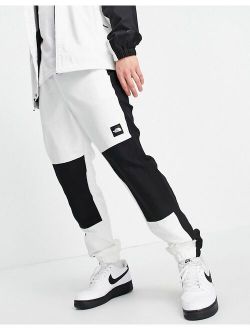 Black Box track pants in white/ black
