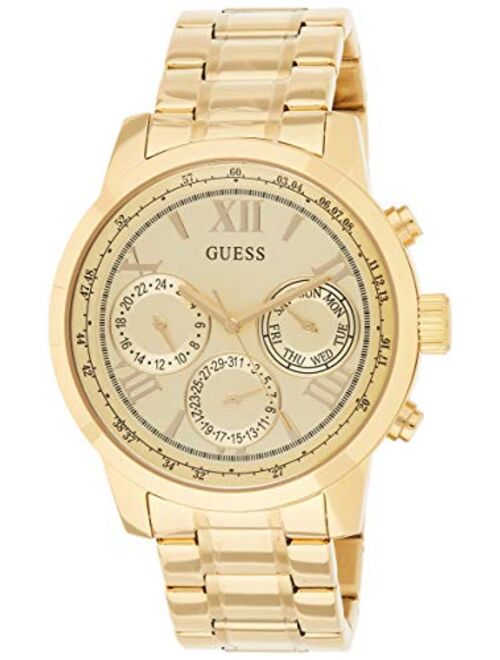 GUESS Classic Gold-Tone Stainless Steel Bracelet Watch with Day, Date + 24 Hour Military/Int'l Time. Color: Gold-Tone (Model: U0330L1)