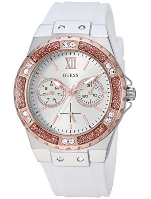 GUESS Stainles Steel + Rose Gold-Tone White Stain Resistant Silicone Watch with Day + Date Functions. Color: White (Model: U1053L2)