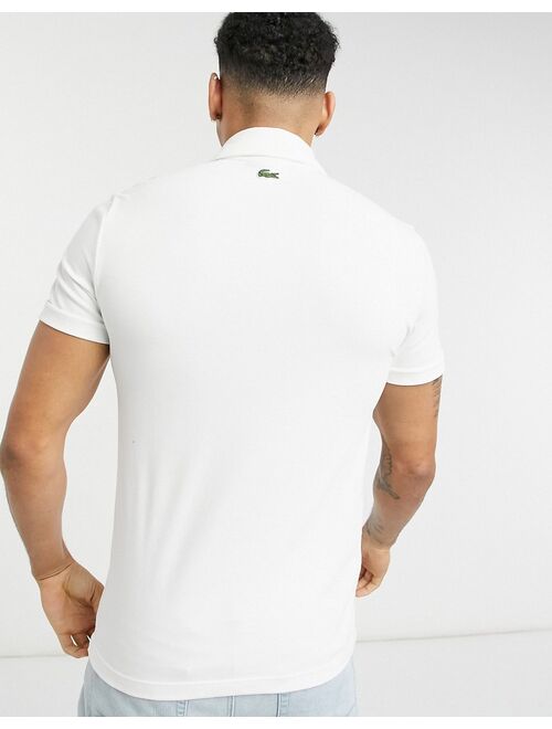Lacoste cut and sew short sleeve polo in black/white