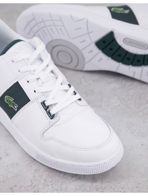 Lacoste Thrill sneakers in white with green stripe