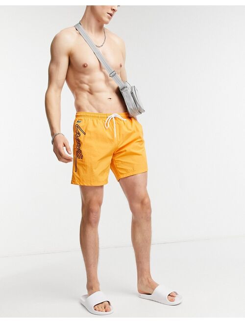 Lacoste live 3D signature print swim shorts