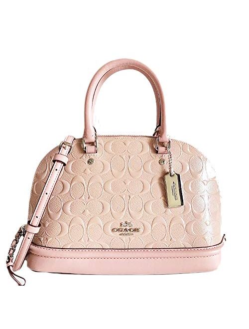COACH Light Pink Patent Leather C logo embossed, attachable strap for shoulder/crossbody wear.