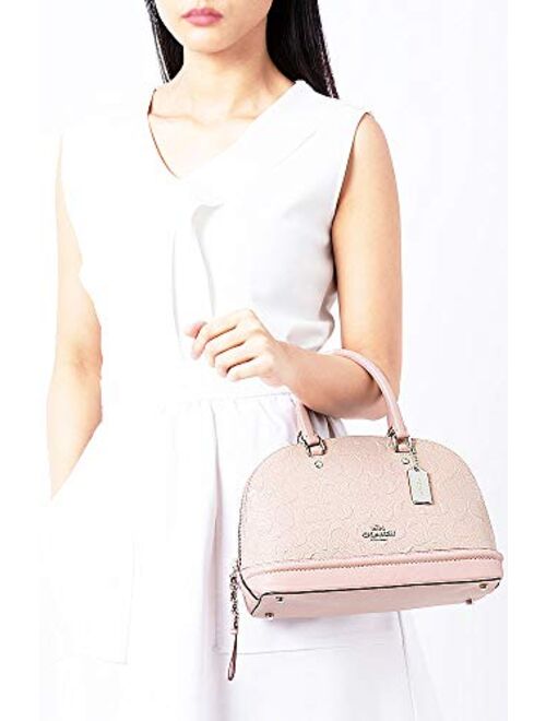 COACH Light Pink Patent Leather C logo embossed, attachable strap for shoulder/crossbody wear.