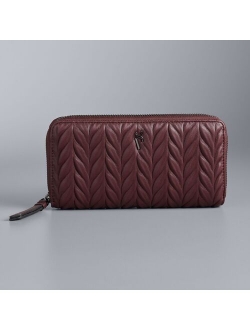 Simply style with this compact and lightweight Vera Vera Wang Signature Wallet