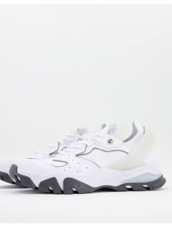 chunky sneakers in white with gray sole