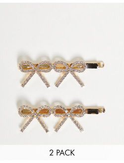 pack of 2 hair clips in gold with diamante bows