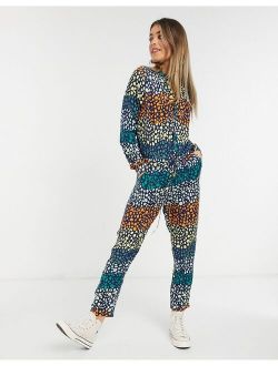 Never Fully Dressed wrap tie roll sleeve jumpsuit in mixed spot print
