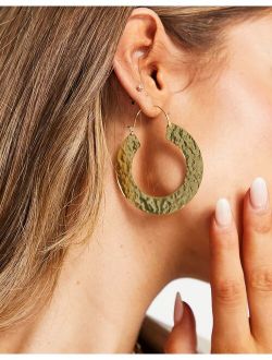 hoop earrings in hammered flat edge design in gold tone