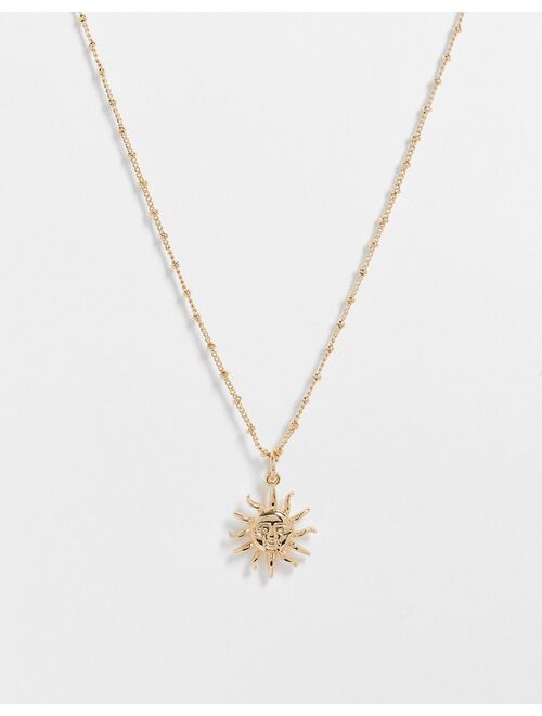 Asos Design necklace with sun pendant in gold tone