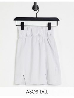 Tall jersey mini skirt with deep shirred waistband and double notch hem in washed gray
