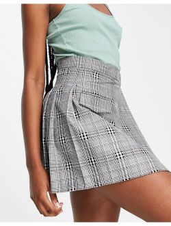 wrap mini kilt skirt with pocket detail in mono check