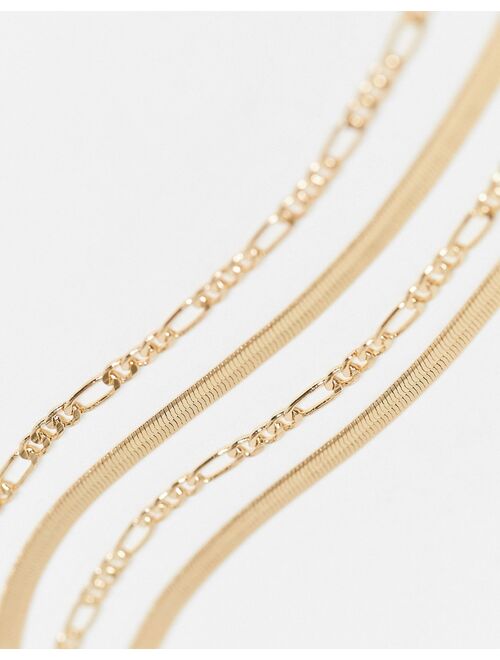 Asos Design multirow necklace with cherry tag pendant in gold tone