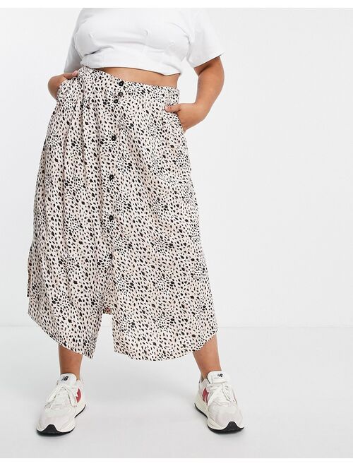 Asos Design Curve button up midi skirt with deep pocket detail in animal print