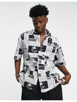 boxy oversized shirt in all over newspaper print