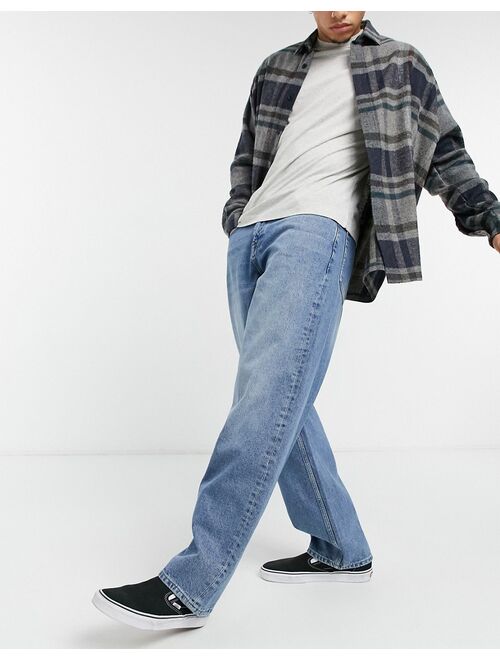 Asos Design ultra baggy jeans in vintage mid wash