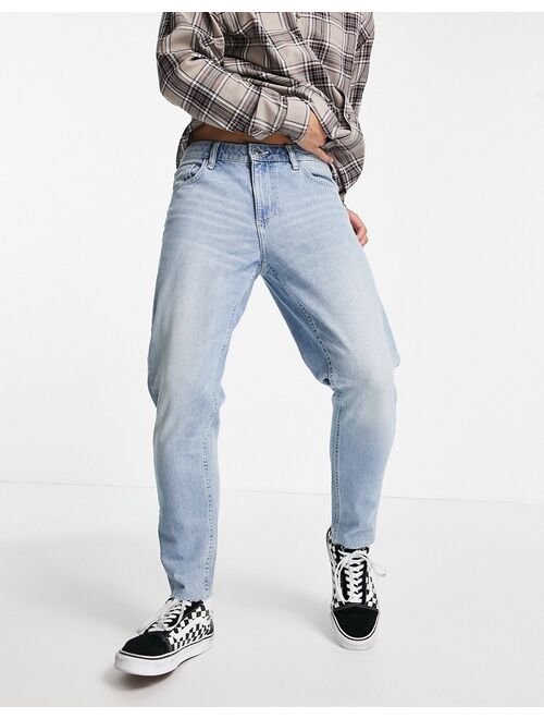 Asos Design classic rigid jeans in light wash blue with raw hem