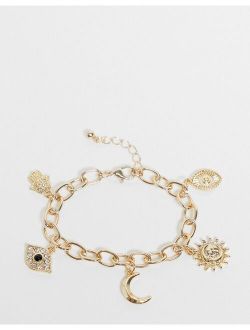 charm bracelet with celestial charms in gold tone