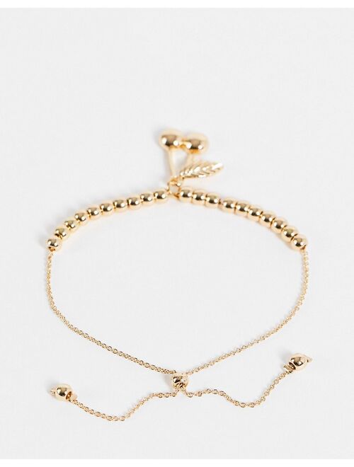 Asos Design bracelet with cherry charm in gold tone