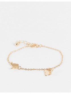 chain bracelet with delicate butterfly charms in gold tone