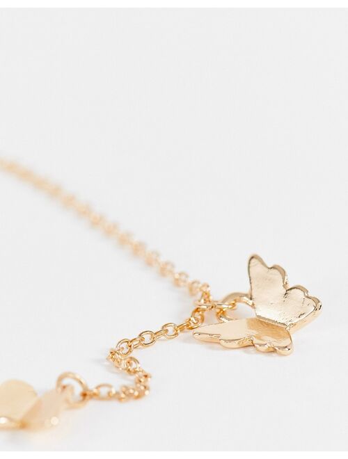 Asos Design chain bracelet with delicate butterfly charms in gold tone