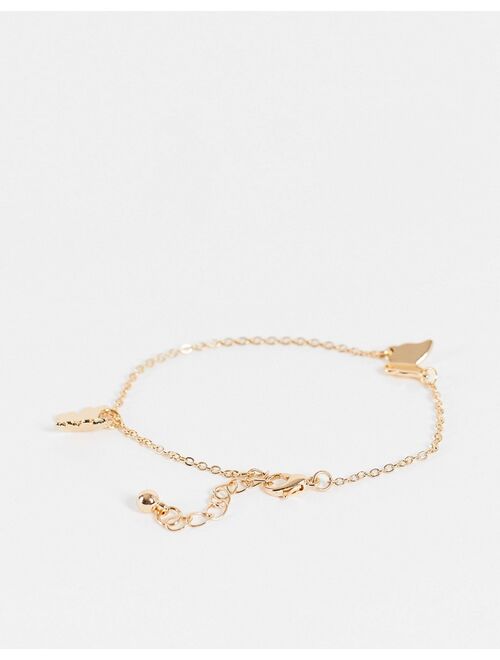 Asos Design chain bracelet with delicate butterfly charms in gold tone