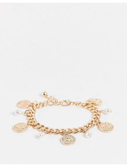 chain bracelet with coin charms and pearl in gold tone