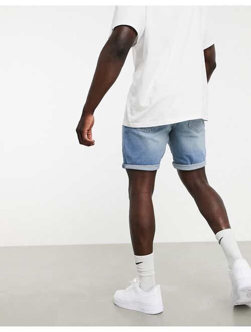 Asos Design slim denim shorts in mid wash blue