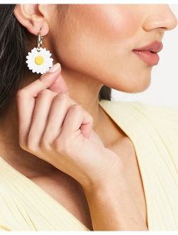 hoop earrings with large daisy charm in gold tone
