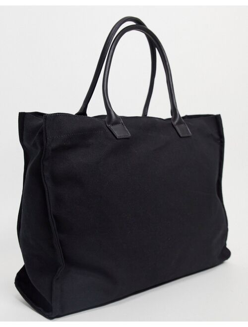 Mennace heavy canvas totepack in black with logo print