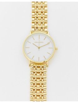 bracelet watch with gold face in gold tone