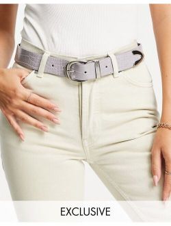 Exclusive belt in lilac croc with silver tip