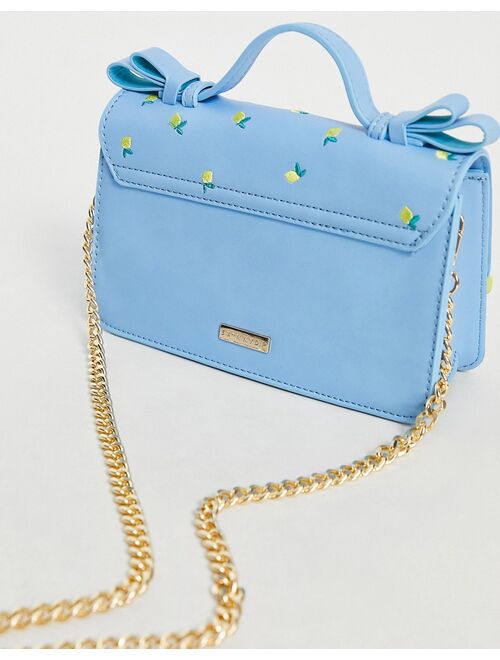 Skinny Dip ditsy lemon embroidered cross body bag in blue and yellow