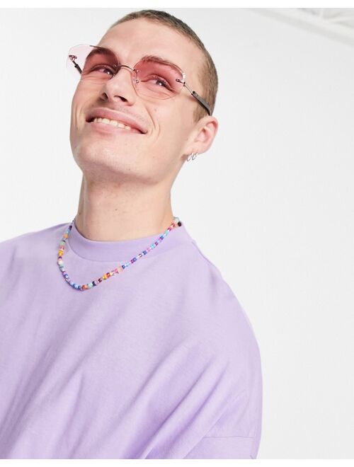 Asos Design rimless retro sunglasses with pink lens