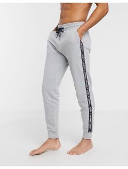 authentic cuffed lounge sweatpants side logo taping in gray marl