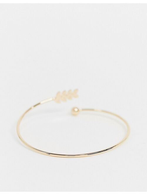 Asos Design cuff bracelet with delicate leaf and ball detail in gold tone