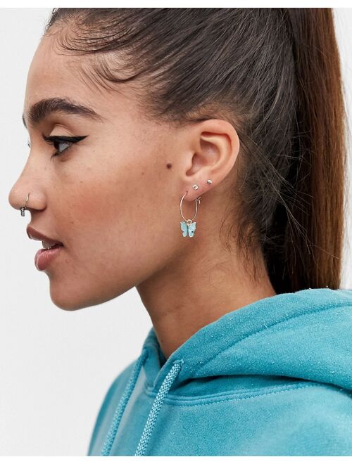 Asos Design hoop earrings with blue butterfly charm in gold tone