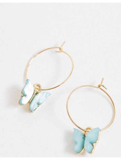 Asos Design hoop earrings with blue butterfly charm in gold tone