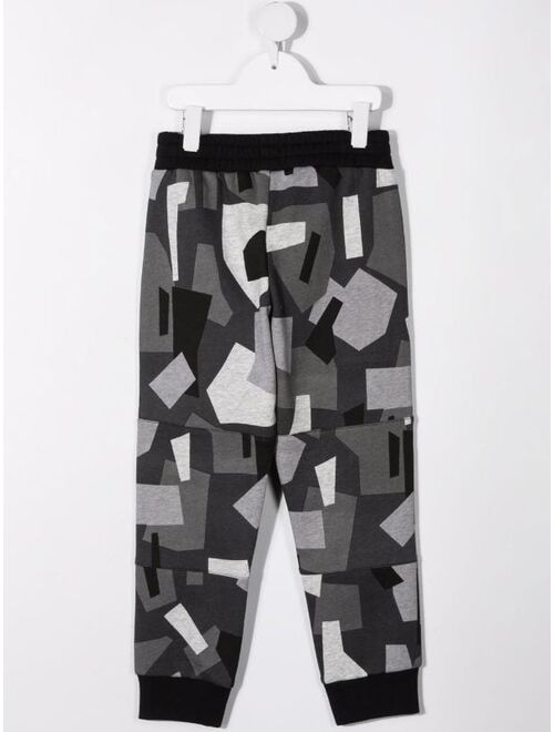 Stella McCartney geometric camouflage track pants