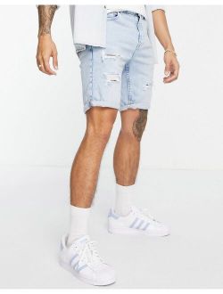 vintage fit denim shorts in bleach blue with rips