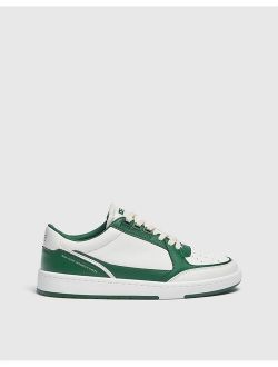 sneakers in white and dark green