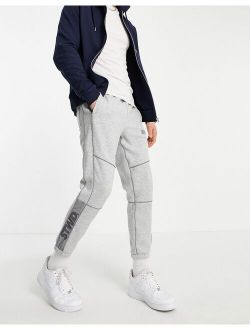 fleece sweatpants in light gray with piping