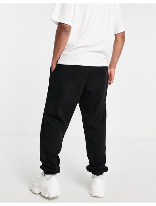 River Island e-waist drawsting oversized sweatpants in black